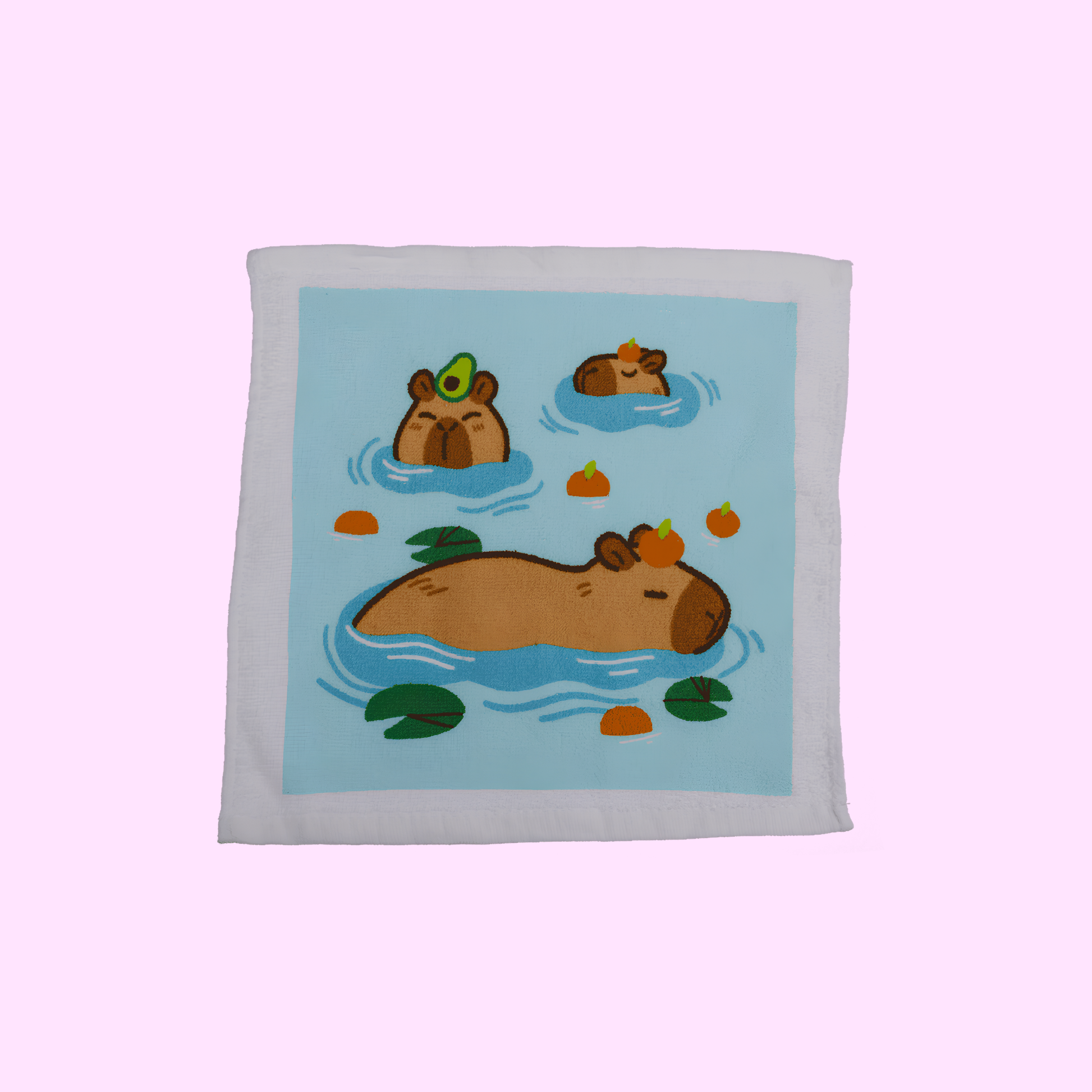 Capybara - Magisches Baumwollhandtuch 30x30cm - Drei Capybara mit blauem Hintergrund - SNACKS24.AT
